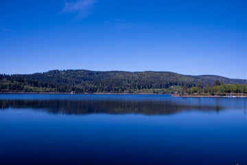 Schluchsee shimmers under the clear summer sky — a tranquil jewel of the Black Forest, perfect for sunlit reflections and peaceful escapes