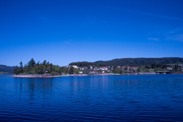 Schluchsee shimmers under the clear summer sky — a tranquil jewel of the Black Forest, perfect...