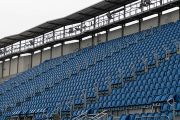 blue empty seats in a stadium