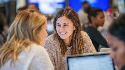 Healthcare interns in middiscussion around laptops at agency workstations main subject crisp with outoffocus peers showcasing innovation in healthcare talentpipeline initiatives.