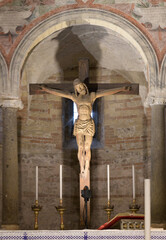Wooden crucifix by Veronese workshop, 1400-1424, in the altar of the Lower Church of San Fermo...