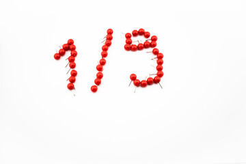 Red push pins form the shape of 