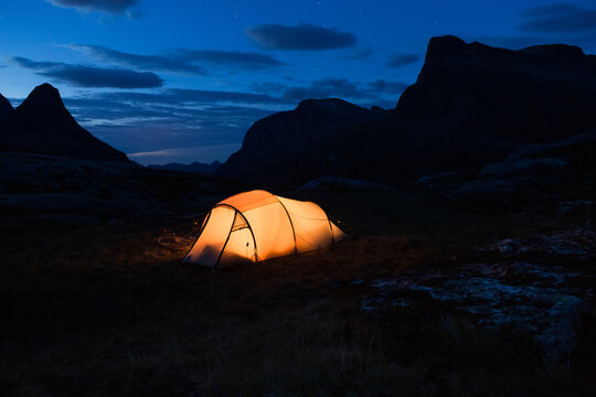 Iluminated tent in Norway at night