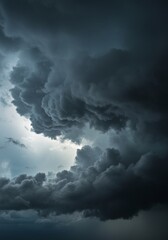 Obraz premium Dark Storm Cloudscape: Dramatic Heavy Grey Clouds in a Moody Sky