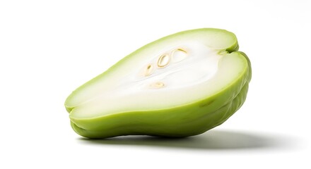 A halved green chayote squash shown from the side on a white background