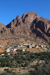 Naklejka premium Anti-Atlas mountains landscape and small village near Tafraout, Morocco. Sunrise light.