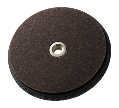 Flexible abrasive disc with a hook and loop attachment for sanding contoured surfaces in a furniture workshop.