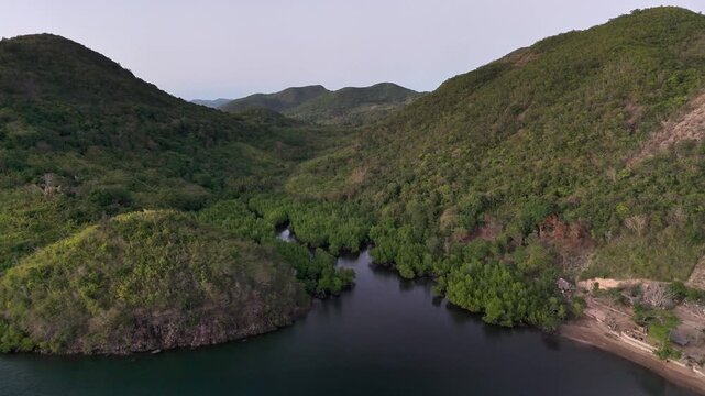 Drone footage of the headwaters of the river and hte hills in Sitio Coring, Bay in Western Culion Island, Philippines