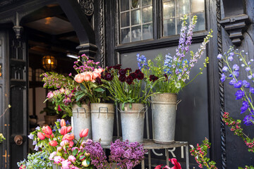 Fototapeta premium Abundant Floral Display At A flower Shop Entrance.