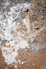 Concrete and cement stains on ground. Abstract messy construction background
