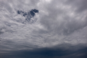 dark storm clouds with background,Dark clouds before a thunder-storm.	