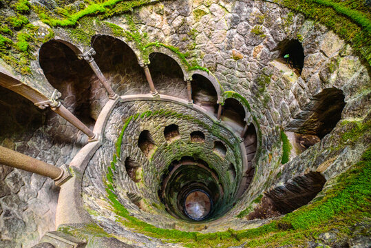 Spiral Initiation Well of Quinta da Regaleira in Sintra, Portugal with Mystical Atmosphere