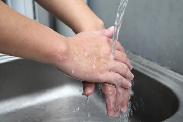 Wash your hands to clean germs.