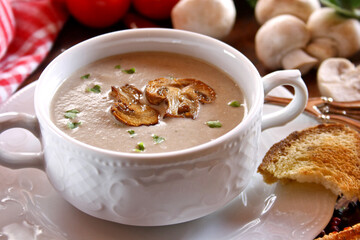 Creamy mushroom soup in ceramic bowl
