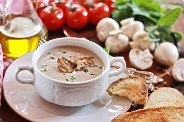 Creamy mushroom soup in ceramic bowl
