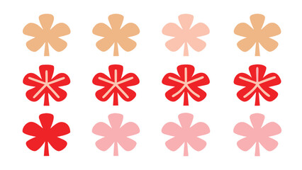 Arrangement of twelve stylized flowers in shades of red pink and tan on a white background surface view