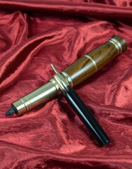 Naklejka premium A still life close-up of a sleek, culturally inspired Indian kajal (kohl) stick, emphasizing traditional beauty, cosmetics, and elegant product design