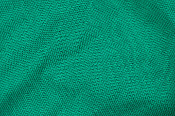 Close-Up of Abstract Green Emerald Cotton Textile Surface Top View