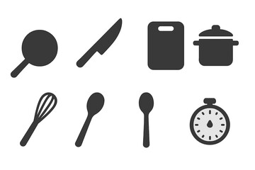 Cooking tools and utensils displayed on a kitchen counter with focus on meal preparation activities