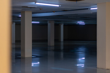 An empty and dark basement with dim light