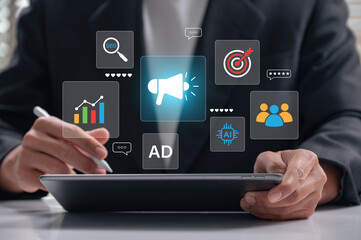 Marketing strategy and digital advertising concept. businessman using tablet with icons of SEO, AI,...
