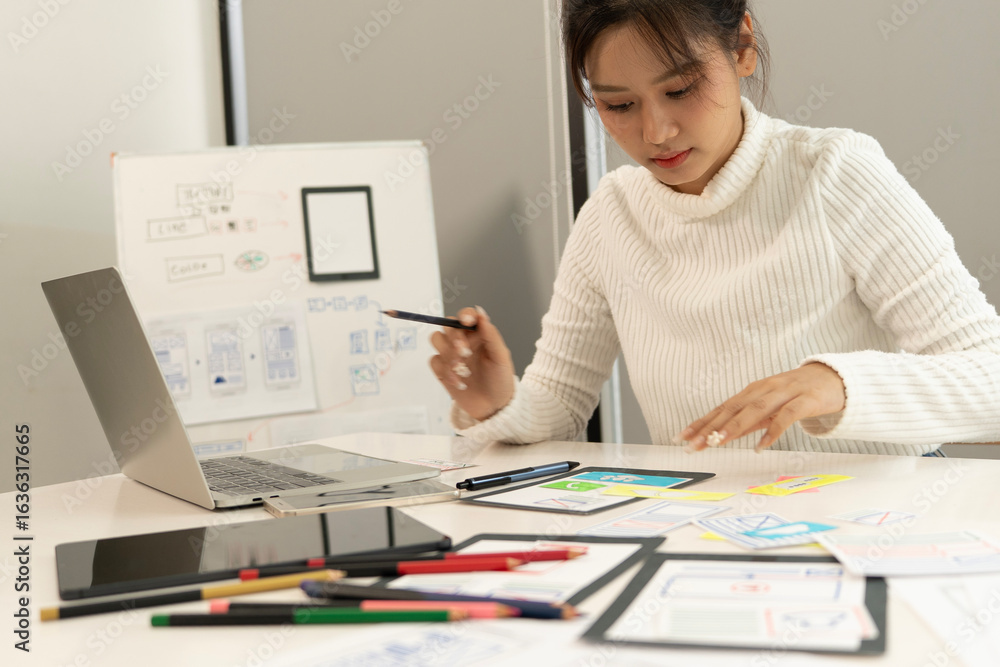 Wall mural creative web designer planning ui application and developing digital template