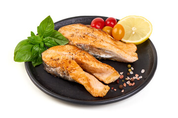 Grilled Salmon Fillets with Cherry Tomatoes and Basil, isolated on white background