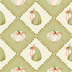 Autumnal patchwork seamless pattern with pumpkins and Bows. Vector illustration for blanket, gift paper, textile design, or so.