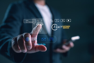 Businessman using AI chatbot for 24/7 customer service via virtual interface, symbolizing artificial intelligence support, online communication, and modern digital business solutions.