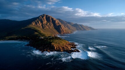 Fototapeta premium Aerial view of the Cape Hangklip point in South Africa, near the meeting of sea and sky, a large island with rocks is visible from above