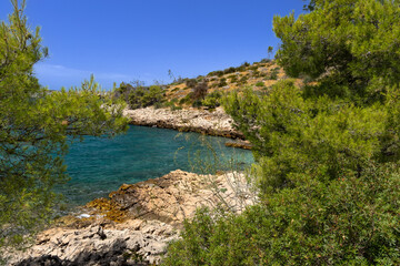The path to the wild beach of Vela i Mala Draga on the coast of the island of Ciovo