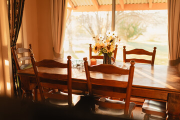 Vase filled with fresh flowers in rustic Australian country kitchen