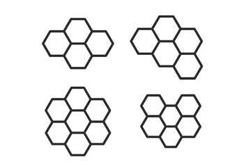 Geometric shapes arranged in various patterns showcasing hexagonal designs and symmetry in contrasting colors