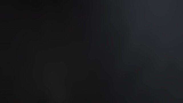 Solid gray background with subtle light areas. Suitable for minimalist designs, product photography, or sleek website backgrounds.