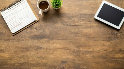 Cozy Workspace Setup with Coffee, Calendar, and Tablet on Wood Desk