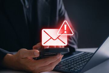 Concept of phishing scam, cyber threat, email fraud, and online security. Warning spam email alert...
