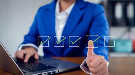 Businesswoman mark checkboxes, Survey form, check marks on checklist,Checklist concept.