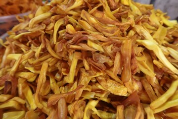 crunchy deep fried jackfruit chips in the background