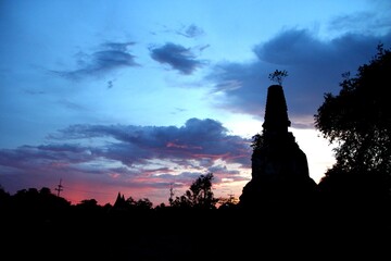 Ancient Thai Pagoda Silhouette at Colorful Twilight Sky in Ayutthaya Historical Park