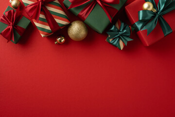 Collection of colorful Christmas presents accented by ornaments, perfect for festive seasonal feel