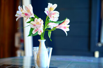 Lilies and daffodils in a vase