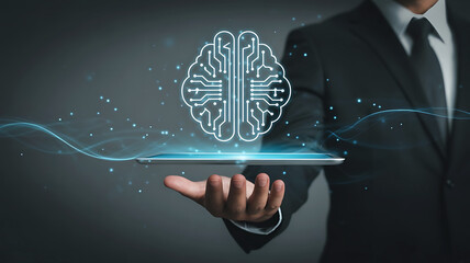 Businessman holding a tablet displaying a glowing digital brain with circuits and data streams