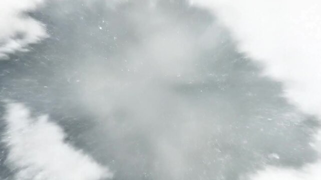 Earth zoom-in animation from deep outer space. Starts with a view of the entire Earth in the blackness of space, with stars in the background. Camera rapidly zooms toward the Earth, passing