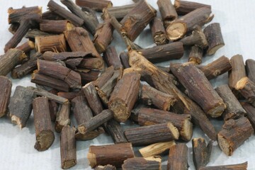 Cinnamomi Ramulus (Gye-ji) is a warming traditional Korean herb used to improve blood flow, ease pain, and reduce chills. Photographed in Korea.