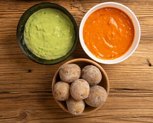 Red mojo rojo and green mojo verde sauces, traditional Tenerife dips, mojo picon dressing