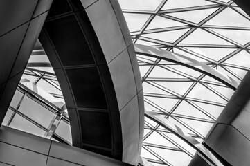 Different geometric elements create a futuristic abstraction, different in shape and texture. Black and white horizontal photo