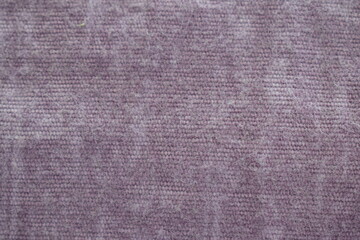  texture of a purple woven fabric