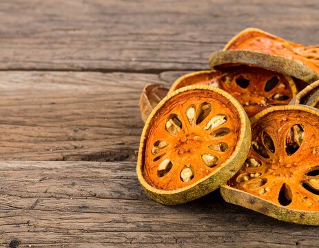 Dried citrus slices on rustic wood