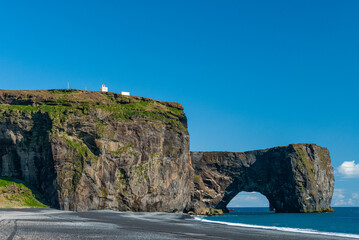Dyrholaey is a 120 m high and precipitous headland. A large, natural gate has been eroded through...