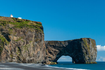 Dyrholaey is a 120 m high and precipitous headland. A large, natural gate has been eroded through...